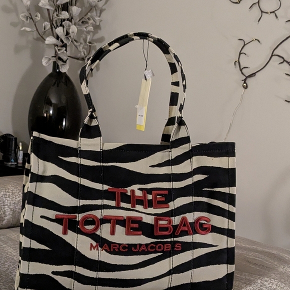 Marc Jacobs Handbags - New!!! Marc Jacobs Large Zebra Print Tote with Red Accents. Firm Price.